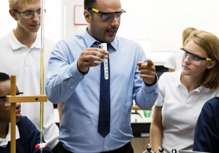 teacher in science class with students